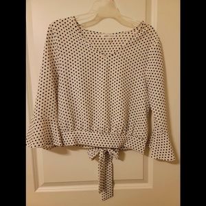 Black and white polka-dot crop top